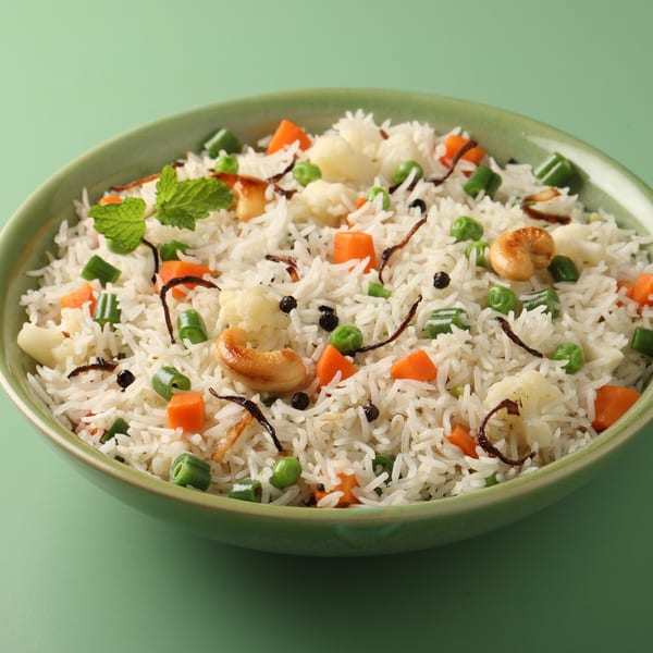 Himalayan Spice Indian Cuisine's vegetable pulao, a rice dish with carrots, peas, cashews, and mint.