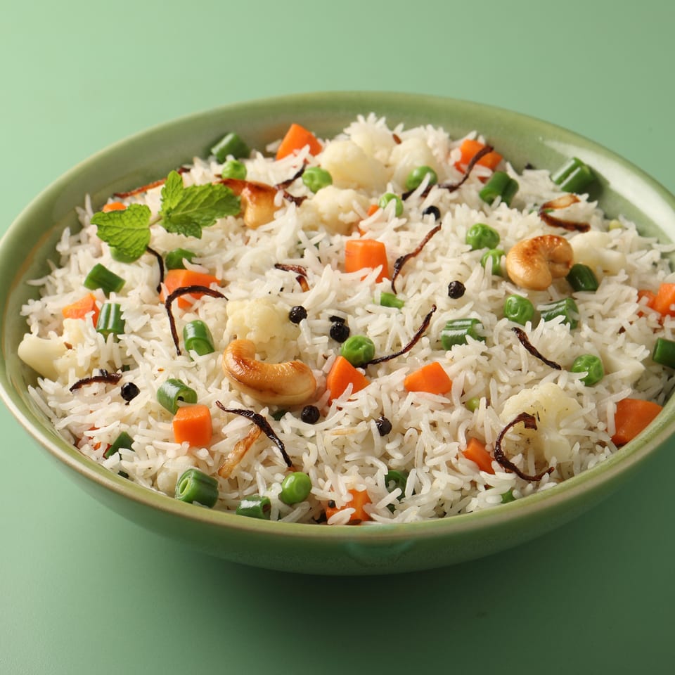 Himalayan Spice Indian Cuisine's vegetable pulao, a rice dish with carrots, peas, cashews, and mint.